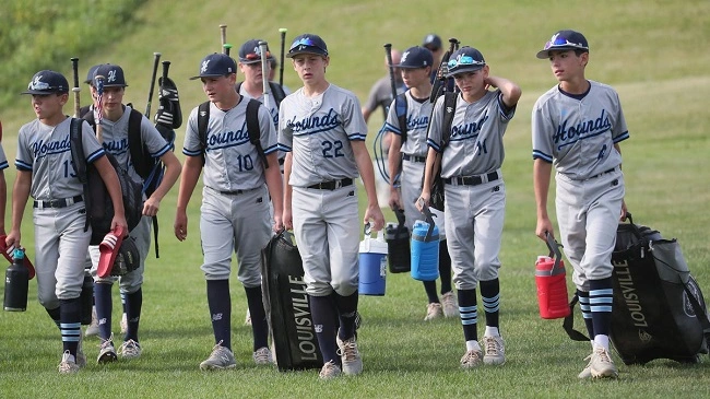 Children preparing for a youth baseball game