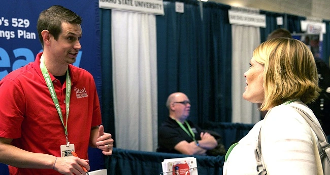 Discussion between a conference sponsor and attendee